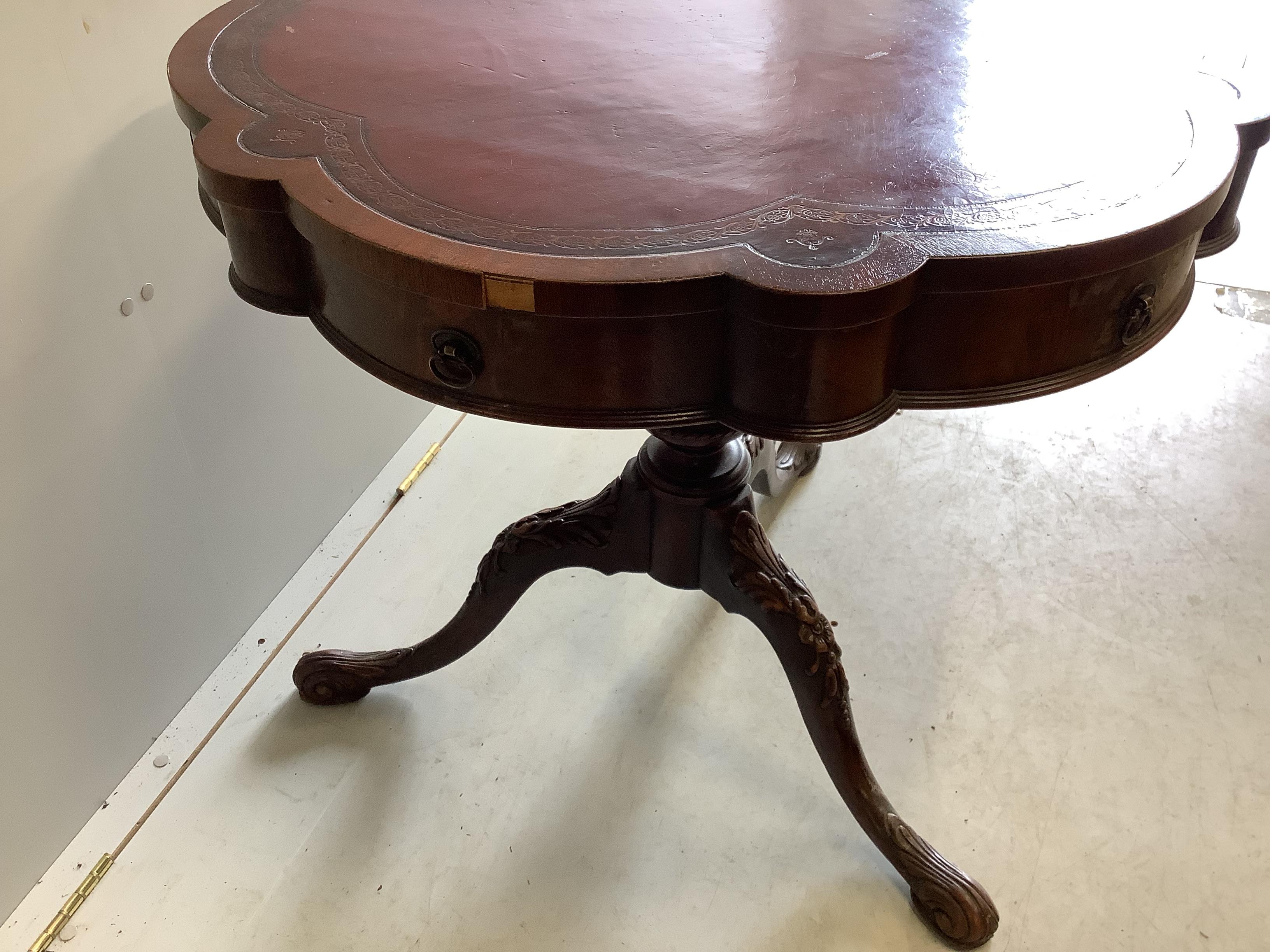 A Victorian style circular mahogany tripod centre table, with leather inset top, diameter 79cm, height 71cm